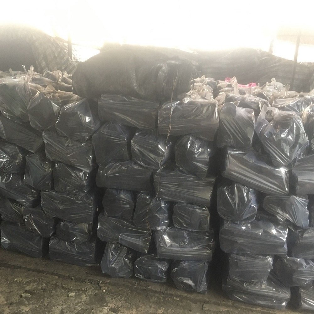 Bulk charcoal packaging prepared for container export from Portugal